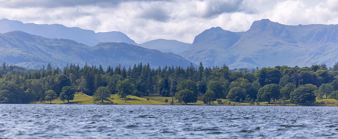 Lake Windermere Image showing lake windermere with hills in the distance.